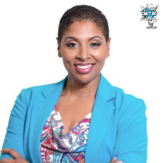 Katrina Carter professional photo, Black woman with short hair in turquoise blazer